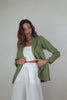 a model in ultra stylish sage green blazer 